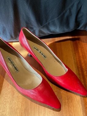 Red leather Manolo Blahnik heels. Size 8.5 or 38.5